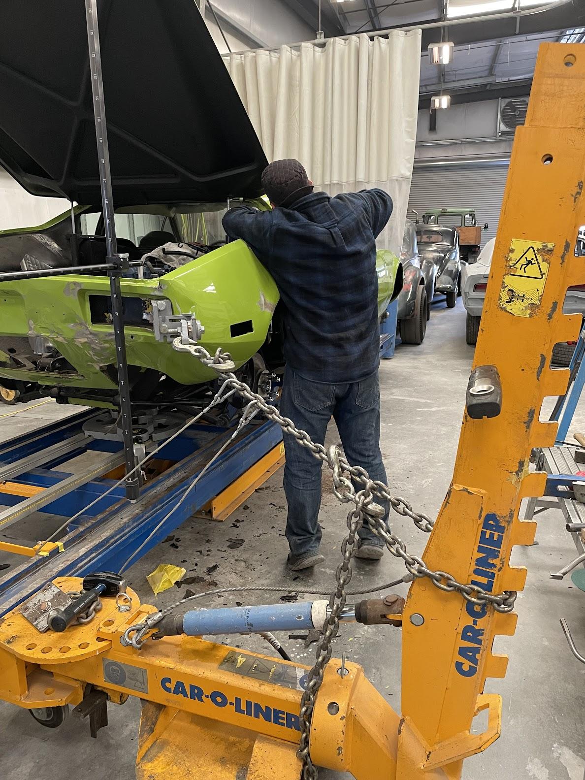 Frame aligner was used to persuade the original bodywork back into place
